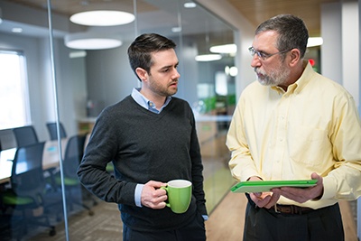 Image of Nordic consultants laying out a plan of action