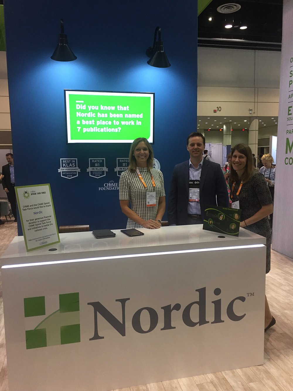 cdn2.hubspot.nethubfs605296social-suggested-imagesHIMSS19 booth front desk-1